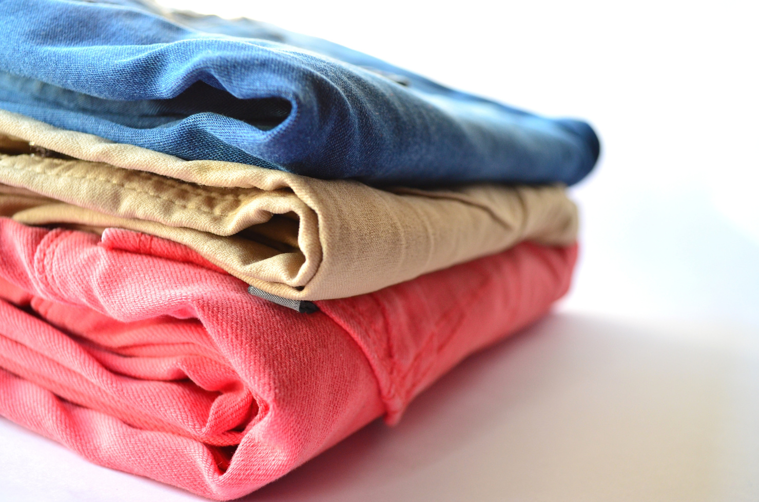 Pile of Folded Pants in Different Colors
